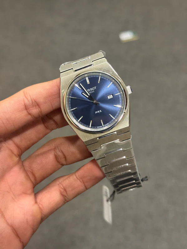 Tissot PRX royal blue plain dial